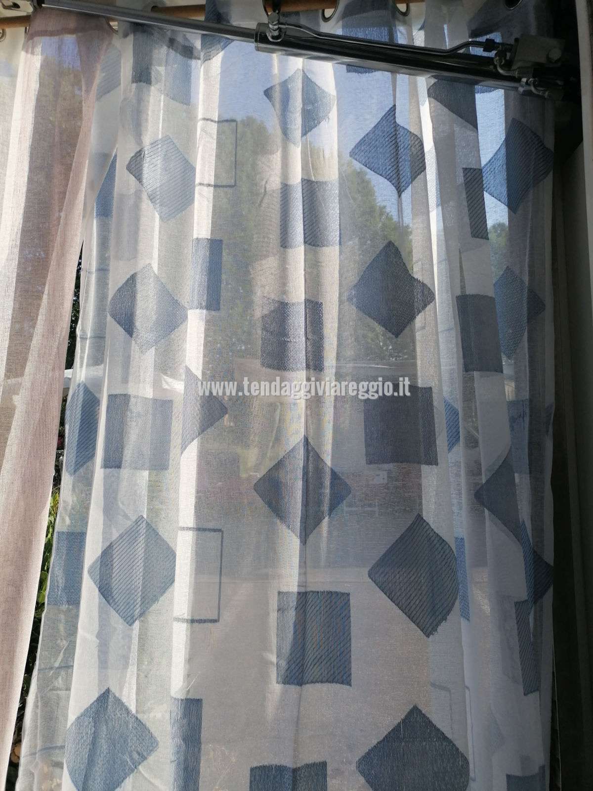 Tendone confezionato con anelli MARELLA color celeste