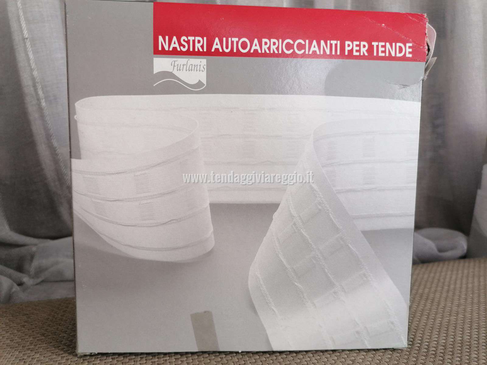 NASTRO MULTITASCHE arricciante bianco o trasparente per l'inserimento dei ganci a proboscide
